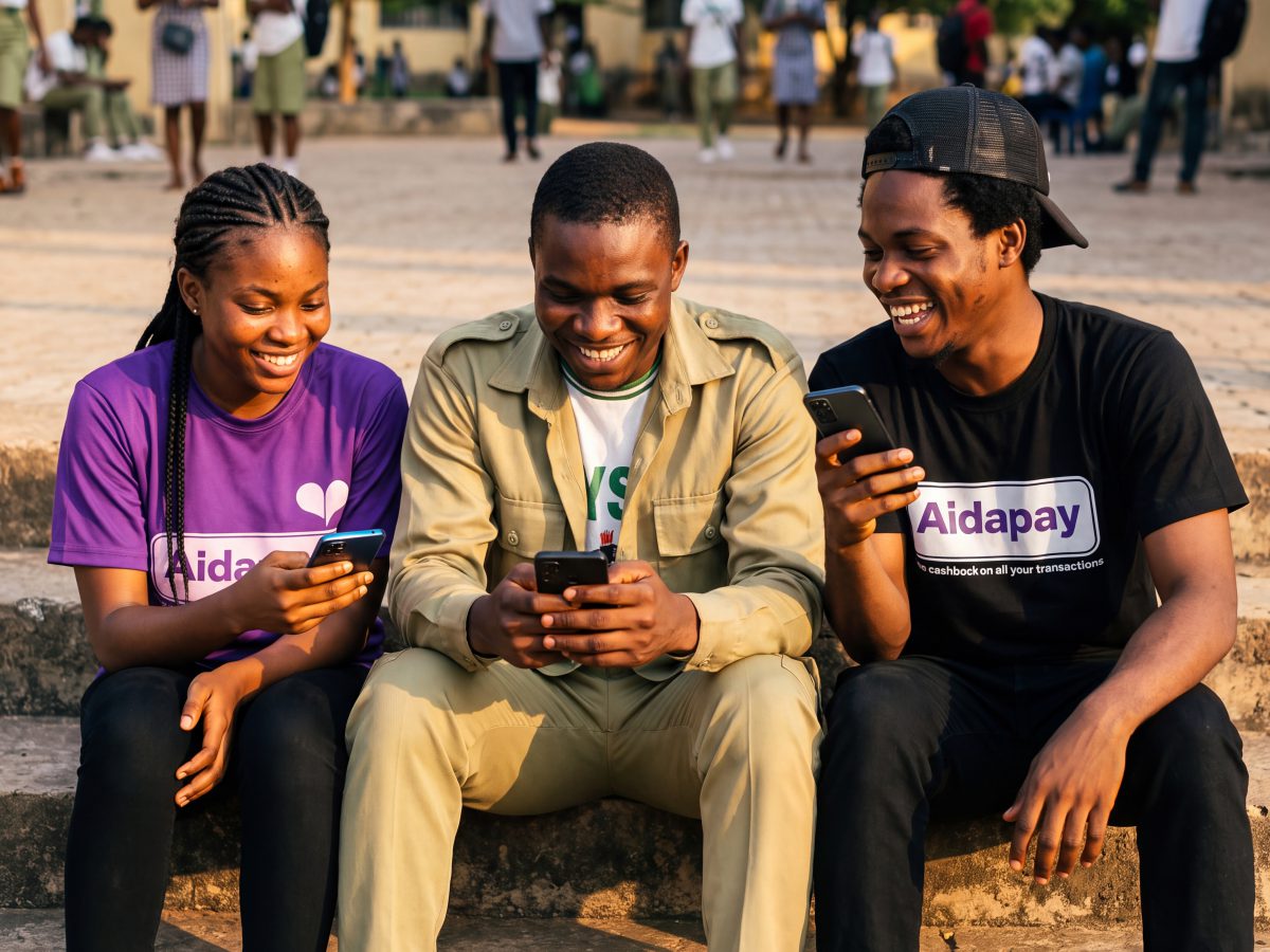 AidaPay brand ambassadors smiling with their phones